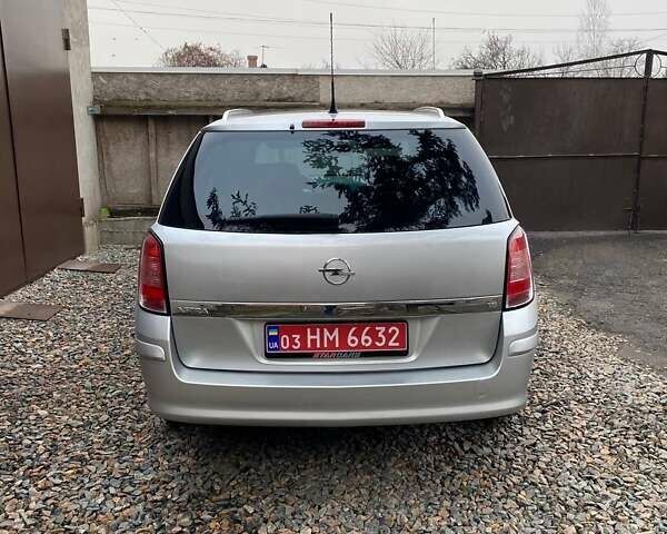 Серый Опель Астра, объемом двигателя 1.6 л и пробегом 172 тыс. км за 5900 $, фото 16 на Automoto.ua