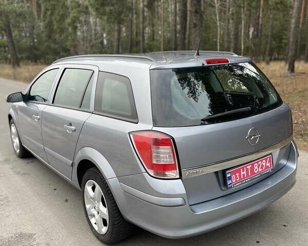 Серый Опель Астра, объемом двигателя 1.4 л и пробегом 193 тыс. км за 4900 $, фото 7 на Automoto.ua