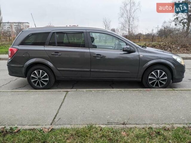 Сірий Опель Астра, об'ємом двигуна 1.4 л та пробігом 194 тис. км за 4999 $, фото 19 на Automoto.ua