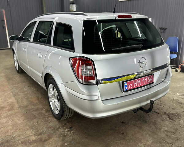 Серый Опель Астра, объемом двигателя 1.6 л и пробегом 195 тыс. км за 5700 $, фото 7 на Automoto.ua