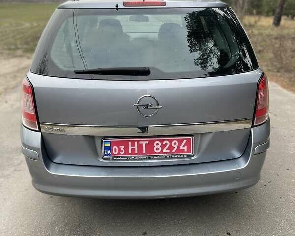Серый Опель Астра, объемом двигателя 1.4 л и пробегом 193 тыс. км за 4900 $, фото 3 на Automoto.ua