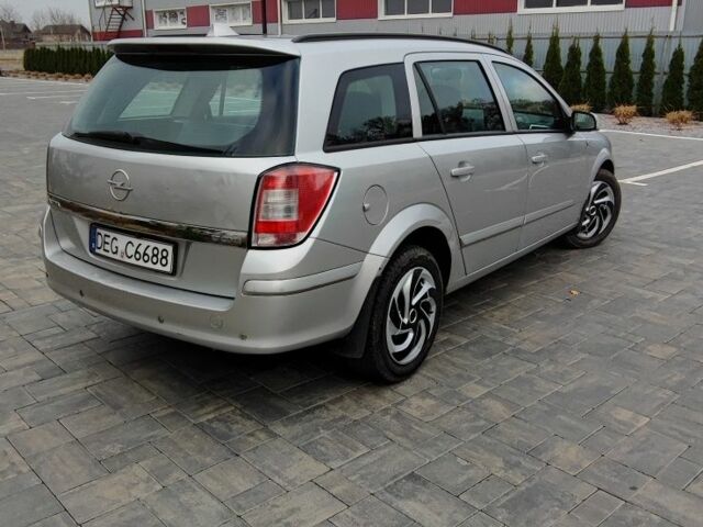 Серый Опель Астра, объемом двигателя 1.7 л и пробегом 275 тыс. км за 1900 $, фото 2 на Automoto.ua