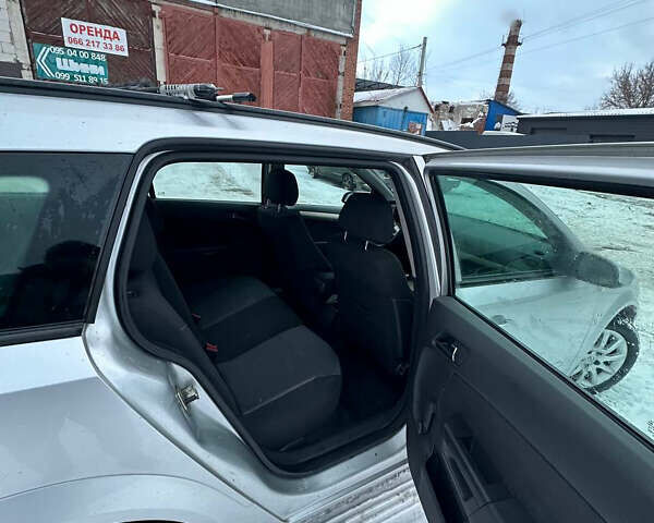 Серый Опель Астра, объемом двигателя 1.6 л и пробегом 213 тыс. км за 5600 $, фото 9 на Automoto.ua