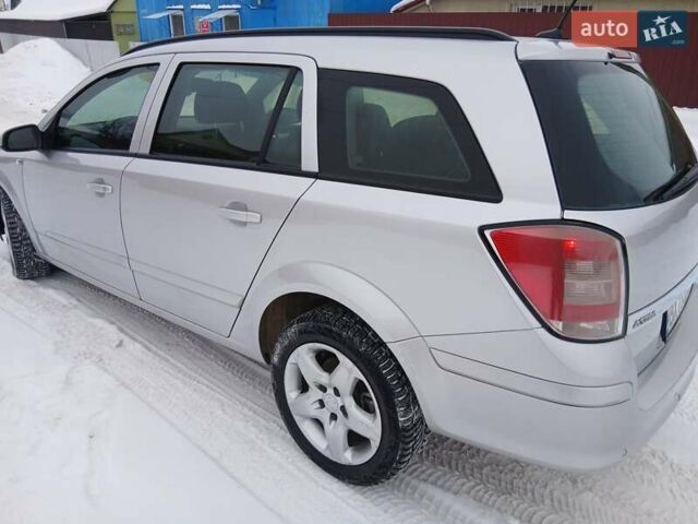 Серый Опель Астра, объемом двигателя 1.9 л и пробегом 244 тыс. км за 5299 $, фото 9 на Automoto.ua