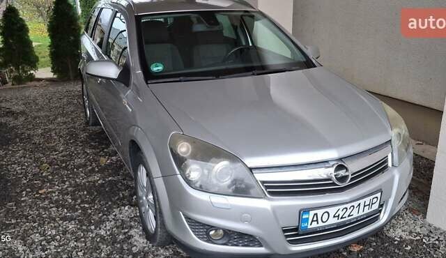 Сірий Опель Астра, об'ємом двигуна 1.69 л та пробігом 235 тис. км за 5000 $, фото 11 на Automoto.ua