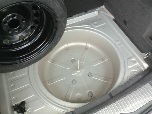 Серый Опель Астра, объемом двигателя 1.4 л и пробегом 240 тыс. км за 5000 $, фото 6 на Automoto.ua