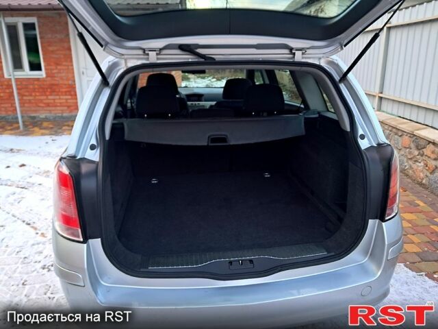 Серый Опель Астра, объемом двигателя 16 л и пробегом 185 тыс. км за 5800 $, фото 9 на Automoto.ua