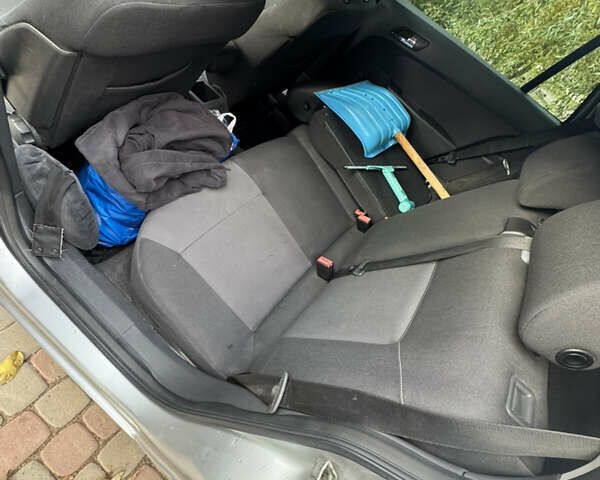 Серый Опель Астра, объемом двигателя 1.6 л и пробегом 283 тыс. км за 5000 $, фото 9 на Automoto.ua