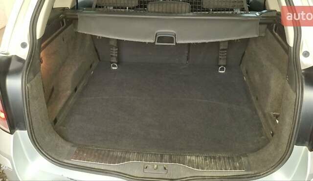 Сірий Опель Астра, об'ємом двигуна 1.69 л та пробігом 235 тис. км за 5000 $, фото 9 на Automoto.ua