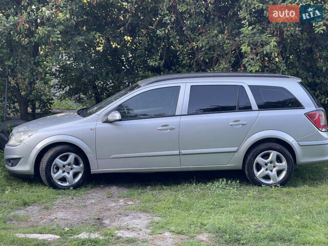 Серый Опель Астра, объемом двигателя 1.7 л и пробегом 260 тыс. км за 4750 $, фото 7 на Automoto.ua