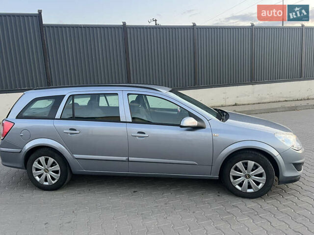 Серый Опель Астра, объемом двигателя 1.6 л и пробегом 234 тыс. км за 5700 $, фото 11 на Automoto.ua