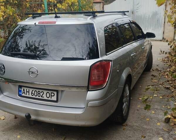 Серый Опель Астра, объемом двигателя 1.6 л и пробегом 205 тыс. км за 5800 $, фото 2 на Automoto.ua