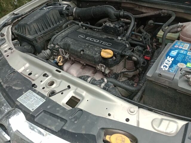 Серый Опель Астра, объемом двигателя 1.4 л и пробегом 240 тыс. км за 5000 $, фото 3 на Automoto.ua