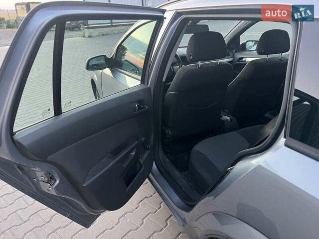 Серый Опель Астра, объемом двигателя 1.6 л и пробегом 234 тыс. км за 5700 $, фото 19 на Automoto.ua