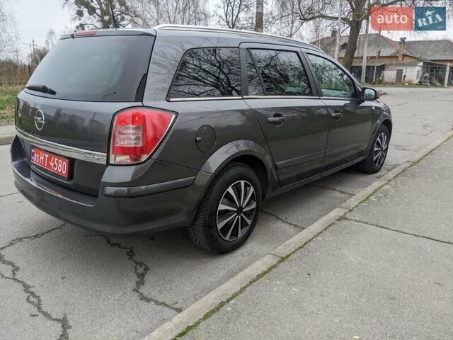 Сірий Опель Астра, об'ємом двигуна 1.4 л та пробігом 194 тис. км за 4999 $, фото 17 на Automoto.ua