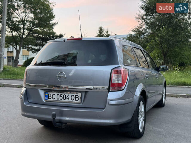 Сірий Опель Астра, об'ємом двигуна 1.69 л та пробігом 226 тис. км за 4499 $, фото 9 на Automoto.ua