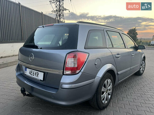 Серый Опель Астра, объемом двигателя 1.6 л и пробегом 234 тыс. км за 5700 $, фото 13 на Automoto.ua