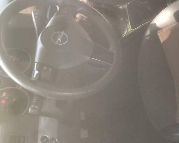 Серый Опель Астра, объемом двигателя 1.69 л и пробегом 278 тыс. км за 5900 $, фото 43 на Automoto.ua