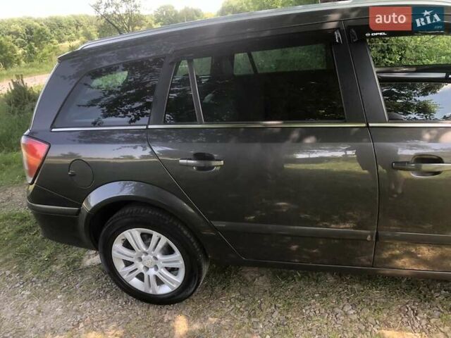 Серый Опель Астра, объемом двигателя 1.69 л и пробегом 278 тыс. км за 5900 $, фото 28 на Automoto.ua