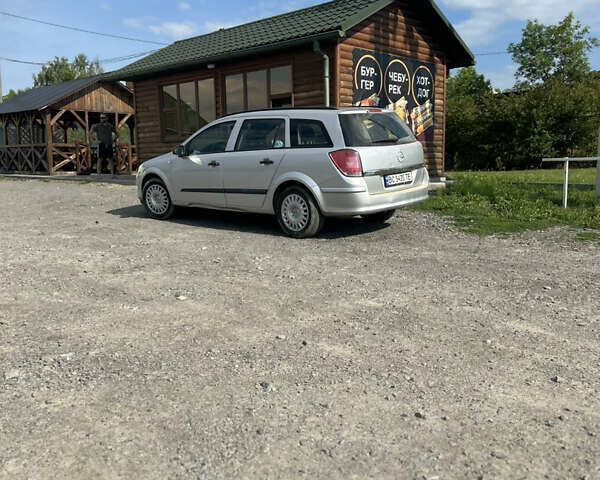 Серый Опель Астра, объемом двигателя 1.6 л и пробегом 210 тыс. км за 4800 $, фото 1 на Automoto.ua