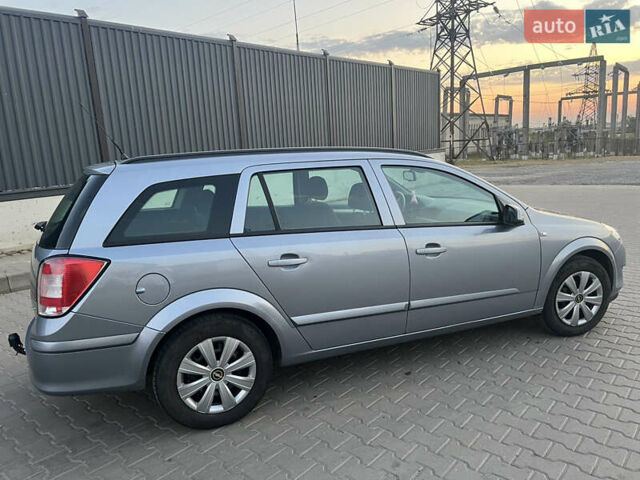 Серый Опель Астра, объемом двигателя 1.6 л и пробегом 234 тыс. км за 5700 $, фото 12 на Automoto.ua