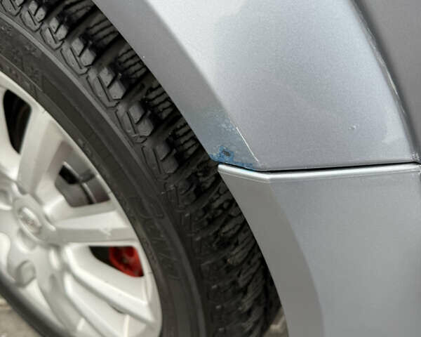 Серый Опель Астра, объемом двигателя 1.6 л и пробегом 289 тыс. км за 4200 $, фото 18 на Automoto.ua