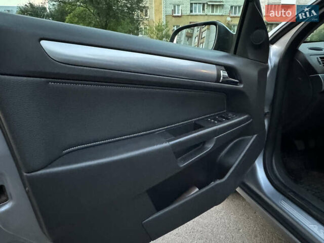 Сірий Опель Астра, об'ємом двигуна 1.69 л та пробігом 226 тис. км за 4499 $, фото 14 на Automoto.ua