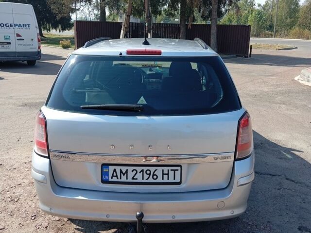 Серый Опель Астра, объемом двигателя 1.7 л и пробегом 325 тыс. км за 4650 $, фото 2 на Automoto.ua