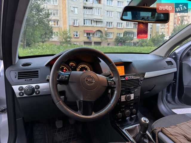 Сірий Опель Астра, об'ємом двигуна 1.69 л та пробігом 226 тис. км за 4499 $, фото 11 на Automoto.ua