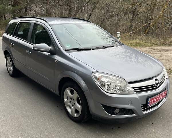 Серый Опель Астра, объемом двигателя 1.4 л и пробегом 193 тыс. км за 4900 $, фото 2 на Automoto.ua