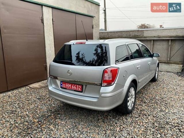 Серый Опель Астра, объемом двигателя 1.6 л и пробегом 172 тыс. км за 5900 $, фото 12 на Automoto.ua