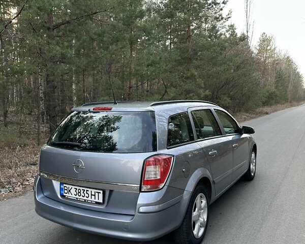 Серый Опель Астра, объемом двигателя 1.6 л и пробегом 216 тыс. км за 5600 $, фото 6 на Automoto.ua