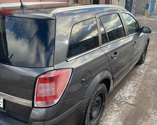 Серый Опель Астра, объемом двигателя 1.6 л и пробегом 234 тыс. км за 5399 $, фото 11 на Automoto.ua