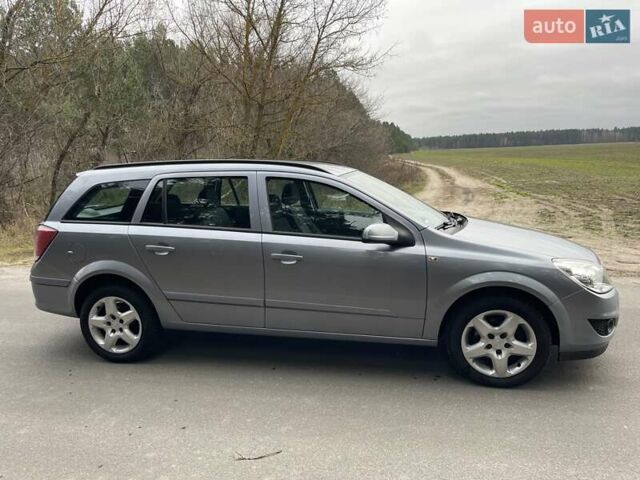 Серый Опель Астра, объемом двигателя 1.4 л и пробегом 193 тыс. км за 4900 $, фото 4 на Automoto.ua