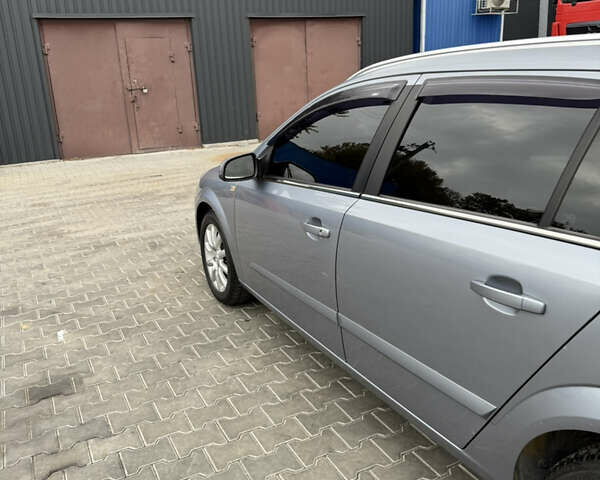 Серый Опель Астра, объемом двигателя 1.6 л и пробегом 289 тыс. км за 4200 $, фото 16 на Automoto.ua