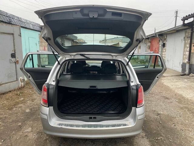 Серый Опель Астра, объемом двигателя 1.6 л и пробегом 230 тыс. км за 5200 $, фото 7 на Automoto.ua