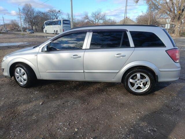 Серый Опель Астра, объемом двигателя 1.2 л и пробегом 210 тыс. км за 5600 $, фото 3 на Automoto.ua