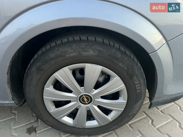 Серый Опель Астра, объемом двигателя 1.6 л и пробегом 234 тыс. км за 5700 $, фото 36 на Automoto.ua