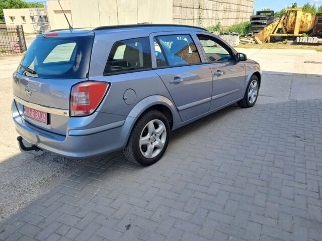 Серый Опель Астра, объемом двигателя 1.6 л и пробегом 156 тыс. км за 5700 $, фото 2 на Automoto.ua