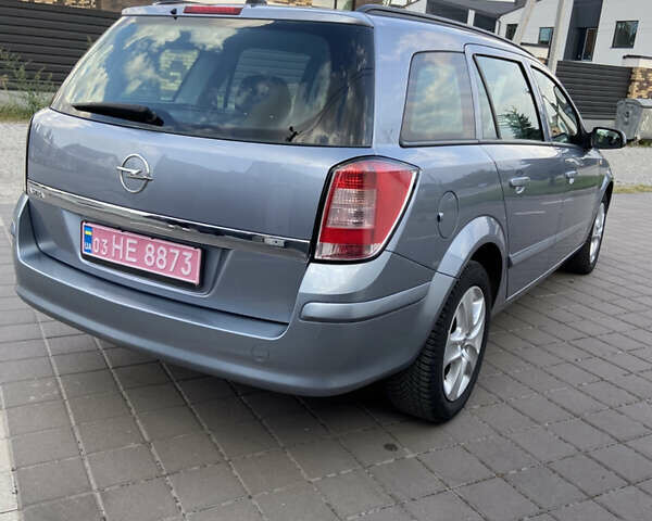 Серый Опель Астра, объемом двигателя 1.6 л и пробегом 214 тыс. км за 5700 $, фото 3 на Automoto.ua