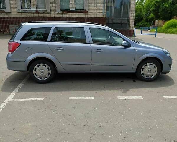 Серый Опель Астра, объемом двигателя 1.6 л и пробегом 230 тыс. км за 5400 $, фото 19 на Automoto.ua