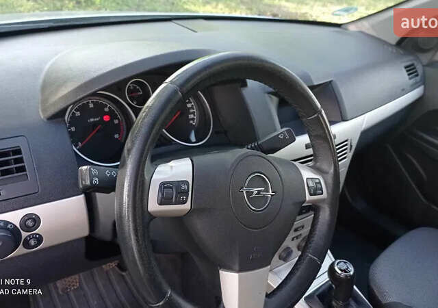 Серый Опель Астра, объемом двигателя 1.69 л и пробегом 308 тыс. км за 5500 $, фото 10 на Automoto.ua