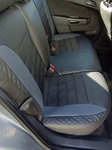 Серый Опель Астра, объемом двигателя 1.6 л и пробегом 140 тыс. км за 7900 $, фото 6 на Automoto.ua