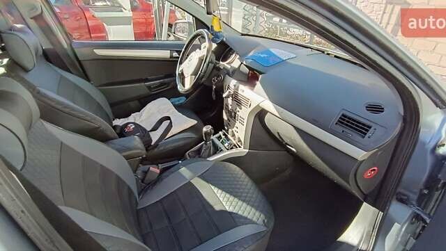 Серый Опель Астра, объемом двигателя 1.6 л и пробегом 140 тыс. км за 7900 $, фото 13 на Automoto.ua