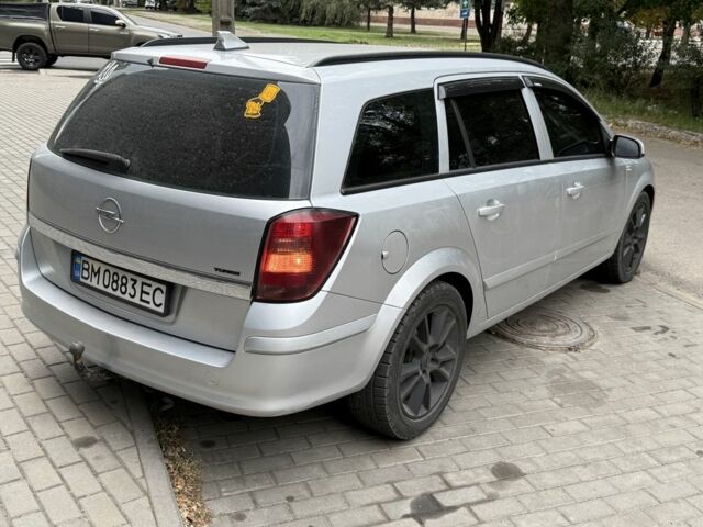 Серый Опель Астра, объемом двигателя 1.7 л и пробегом 228 тыс. км за 5600 $, фото 4 на Automoto.ua