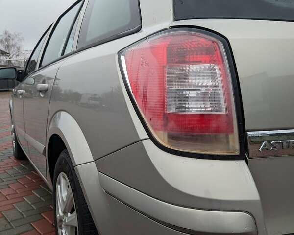 Серый Опель Астра, объемом двигателя 1.6 л и пробегом 240 тыс. км за 5750 $, фото 23 на Automoto.ua