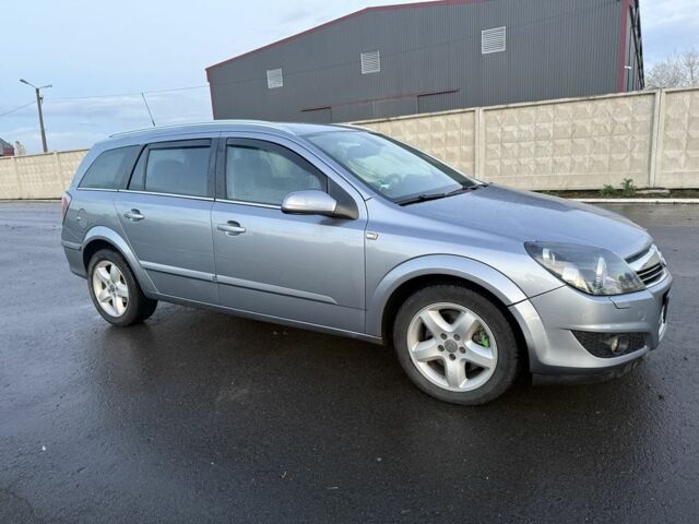 Серый Опель Астра, объемом двигателя 1.9 л и пробегом 227 тыс. км за 2300 $, фото 2 на Automoto.ua