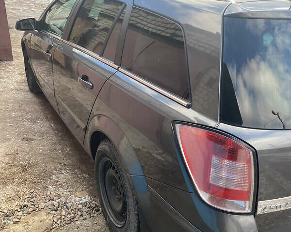 Серый Опель Астра, объемом двигателя 1.6 л и пробегом 234 тыс. км за 5399 $, фото 12 на Automoto.ua