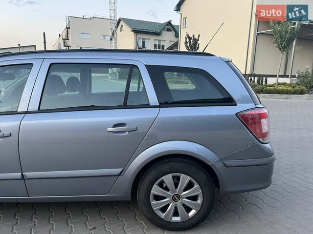 Серый Опель Астра, объемом двигателя 1.6 л и пробегом 234 тыс. км за 5700 $, фото 4 на Automoto.ua