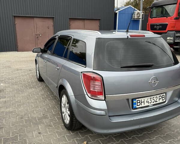 Серый Опель Астра, объемом двигателя 1.6 л и пробегом 289 тыс. км за 4200 $, фото 20 на Automoto.ua